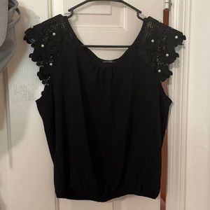 Classy black with pearl on the sleeves shirt